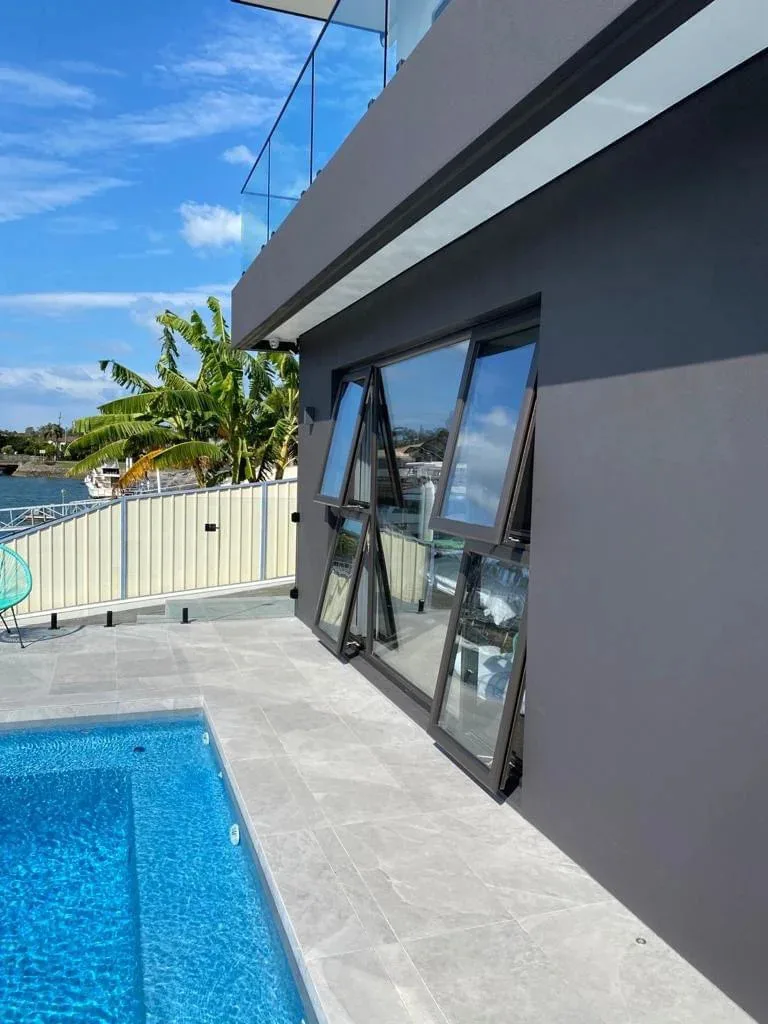 Modern uPVC awning windows with double glazing installed in a residential home in Melbourne, designed for energy efficiency, insulation, and ventilation.